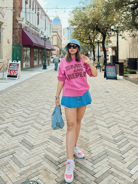 Graphic Sweatshirt and Denim Mini Skirt