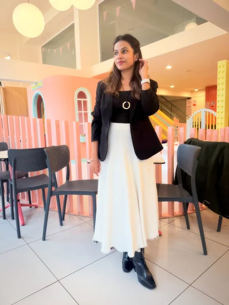 White Knit Midi Skirt and Tailored Black Blazer
