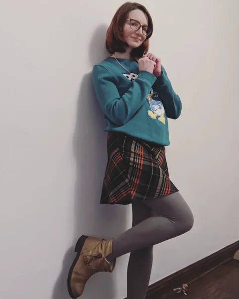 Casual Plaid Skirt with Graphic Sweatshirt