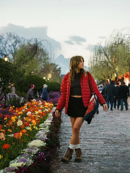 Black Mini Skirt with Red Puffer Jacket