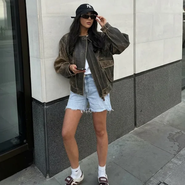 Distressed Leather Bomber Jacket and Denim Shorts