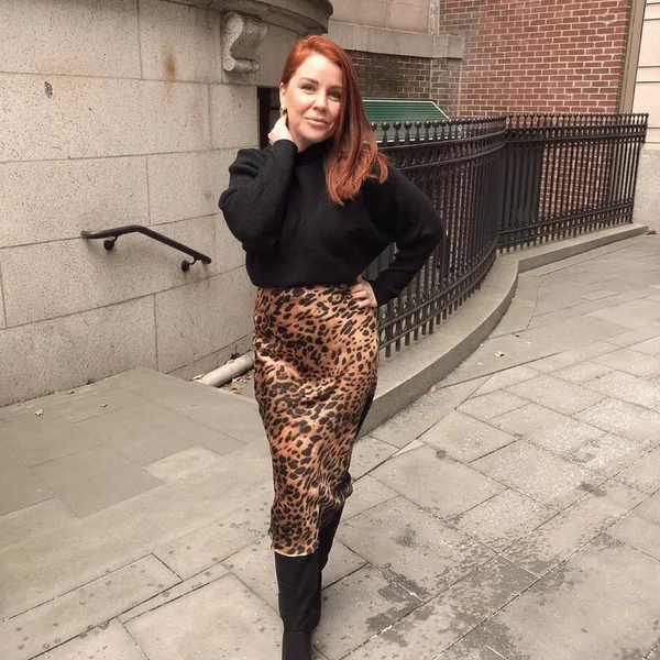 Black Mock-Neck Sweater with Leopard Satin Midi Skirt