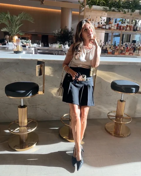 Pleated Black Mini Skirt with Sleeveless Top