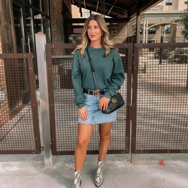 Green Sweatshirt and Light-Wash Raw Hem Denim Skirt
