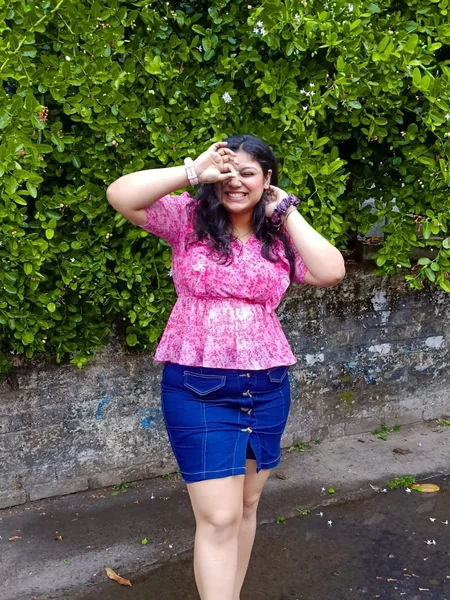 Denim Mini Skirt with Floral Peplum Top