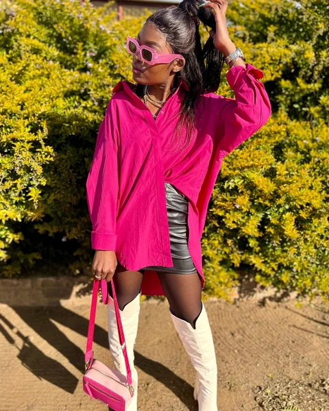 Black Leather Mini Skirt with Oversized Pink Shirt