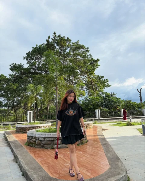 Oversized Tee with Black Short Skirt
