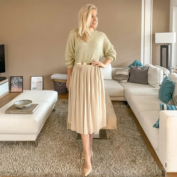 Shimmering Bouclé Sweater with Pleated Champagne Midi Skirt
