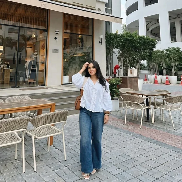 White Ruffled Blouse and Wide-Leg Jeans