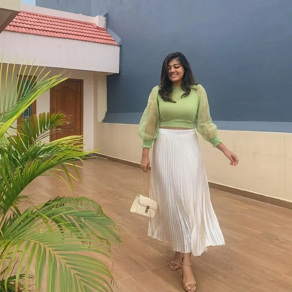 Sheer-Sleeve Sage Top and Pleated White Maxi Skirt