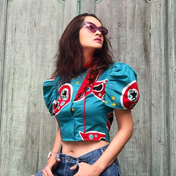 Vibrant Pop-Art Crop Top and Casual Denim