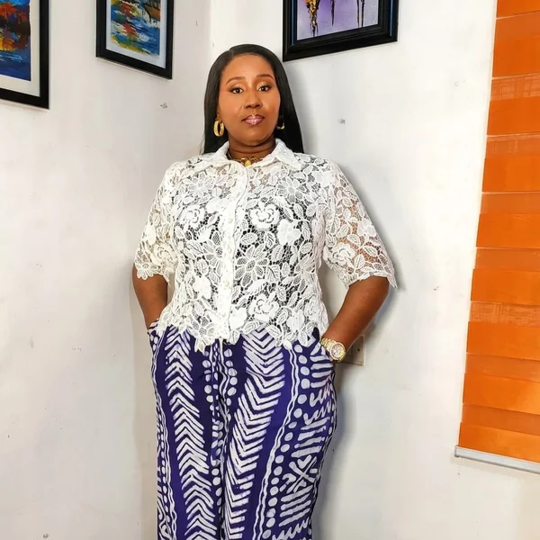 White Short-Sleeve Lace Shirt with Patterned Trousers