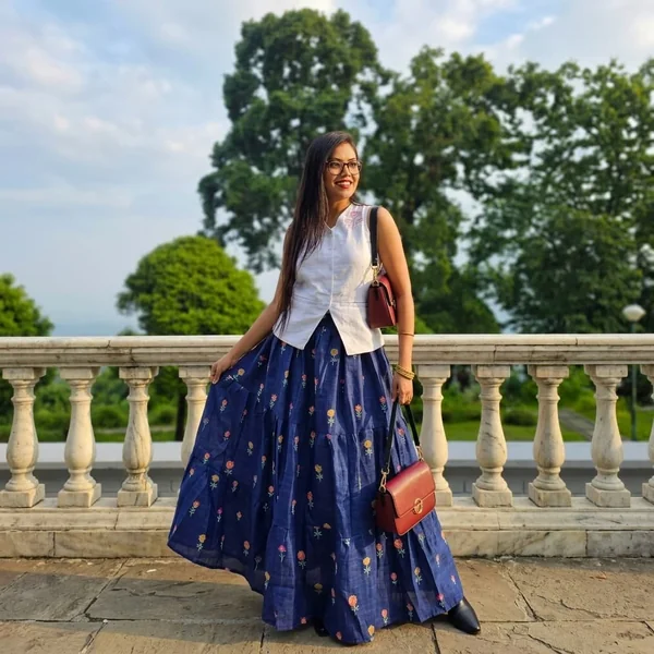 White Embroidered Vest and Tiered Maxi Skirt