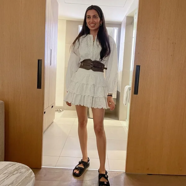 Eyelet Ruffles and Corset Belt Styling