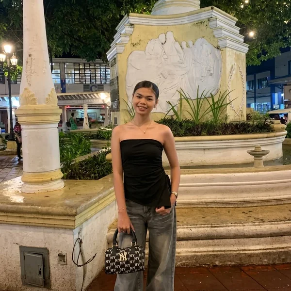 Asymmetric Black Tube Top and Grey Jeans