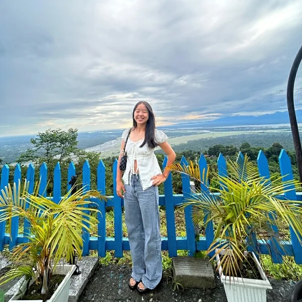 White Tie-Front Blouse and Baggy Jeans