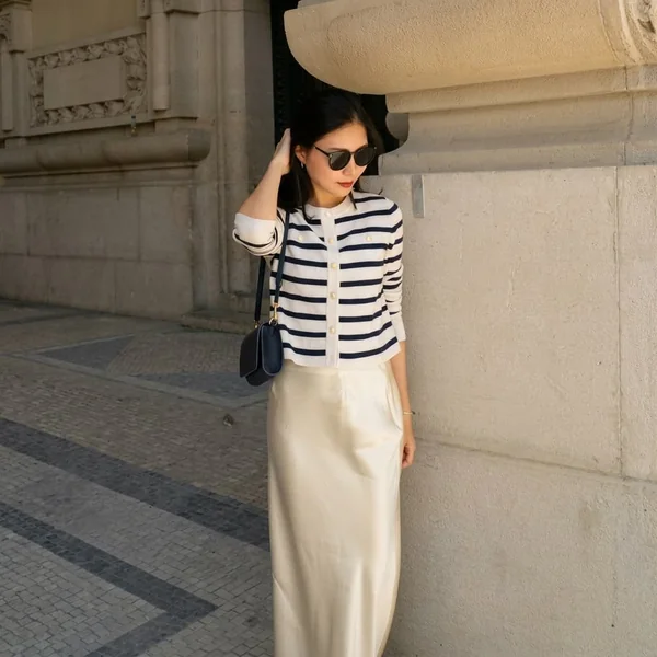 Striped Cardigan and White Satin Skirt