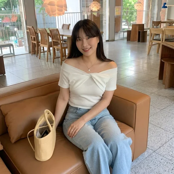 Twist-Front Off-Shoulder Top with Light-Wash Jeans