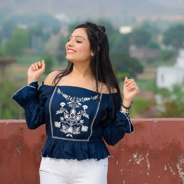 Embroidered Navy Peplum Off-Shoulder Top