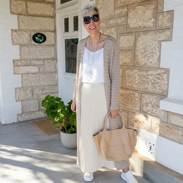 Duster Cardigan and White Satin Skirt