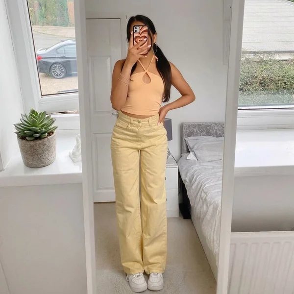 Peach Halter Crop and Pale Yellow Jeans