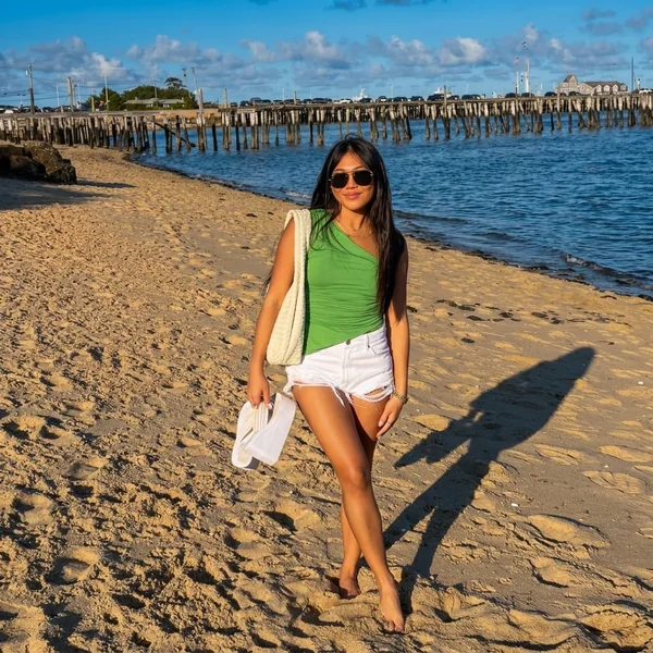 Vibrant One-Shoulder Top with White Denim Shorts