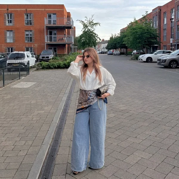 Relaxed White Shirt with Scarf-Accented Wide Jeans