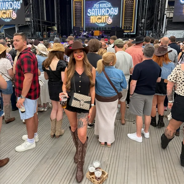Black Vest Romper & Brown Cowboy Boots