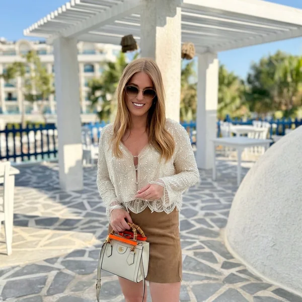 Sheer Embellished Blouse with Suede Mini Skirt