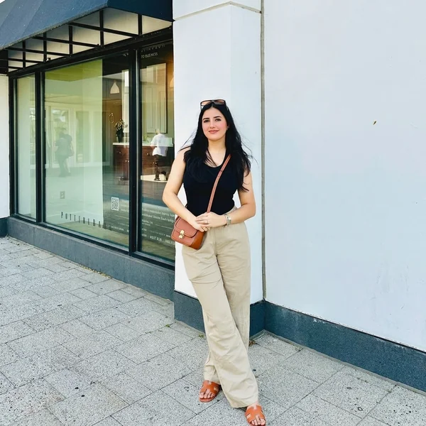 Black Tank Top with High-Waisted Beige Linen Pants