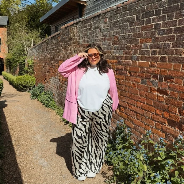 Pink Blazer with Zebra Print Trousers