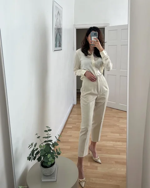 Silk Blouse & High-Waisted Ivory Trousers