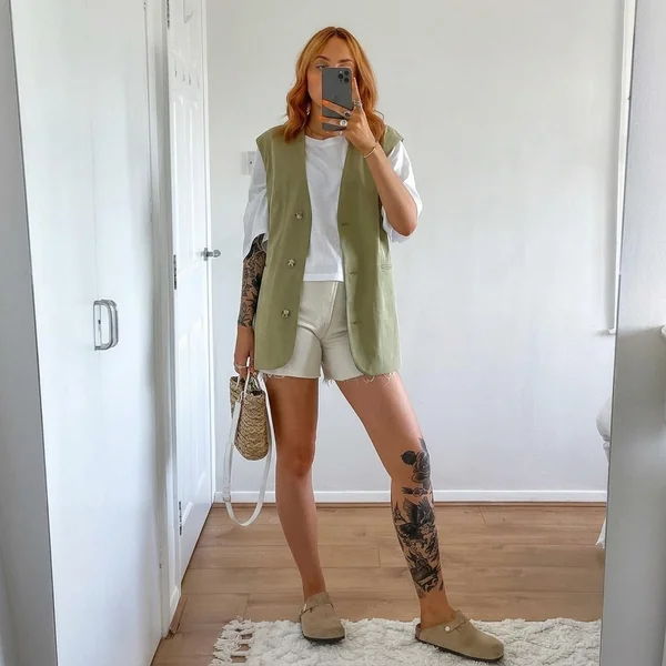Olive Sleeveless Vest with White Tee and Tailored Shorts