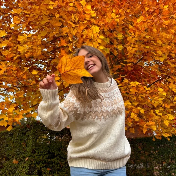 Cream Fair Isle Knit Sweater with Light-Wash Jeans