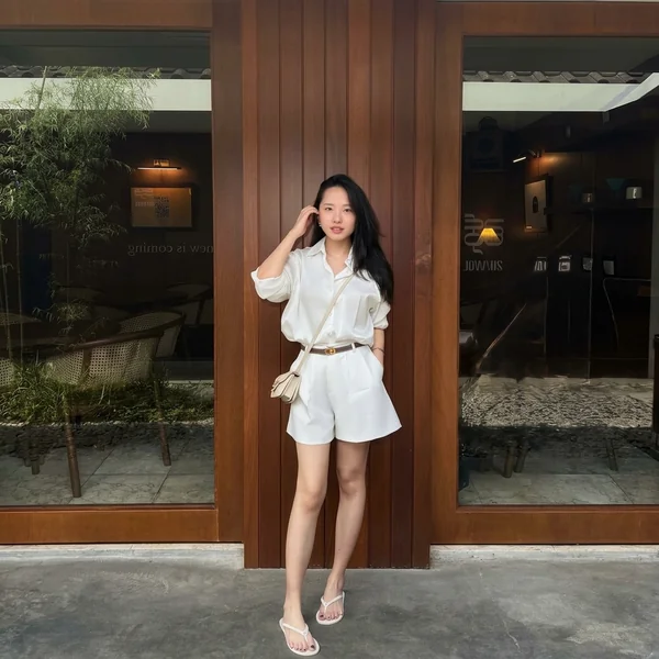Monochrome white shirt and tailored shorts outfit