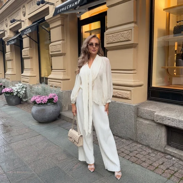 Cream Tie-Neck Blouse and Pleated Trousers