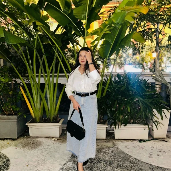 White shirt with denim maxi skirt outfit
